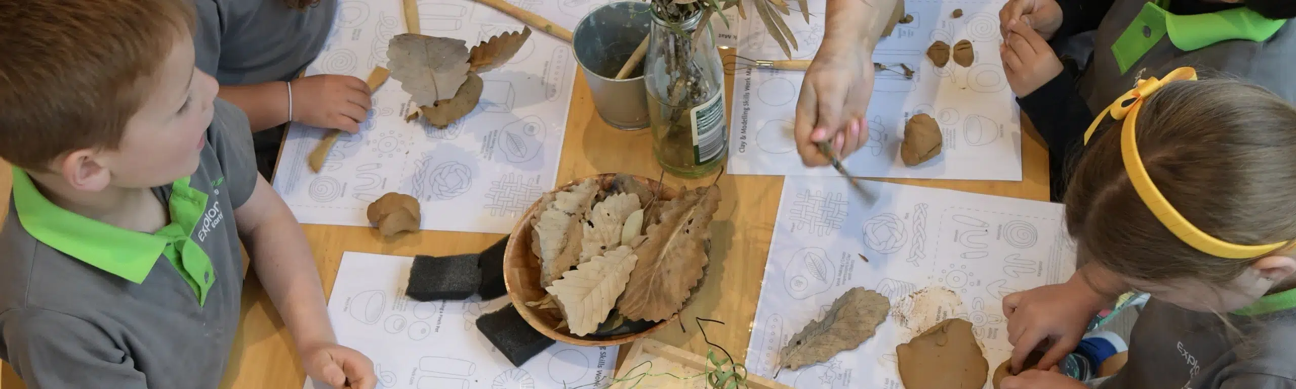 Kindergarten children learning with a qualified teacher at Explorers