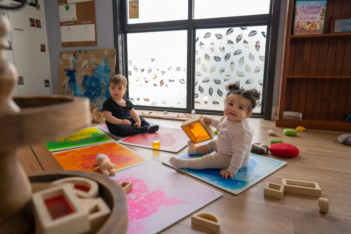 Babies exploring sensory play and early learning activities