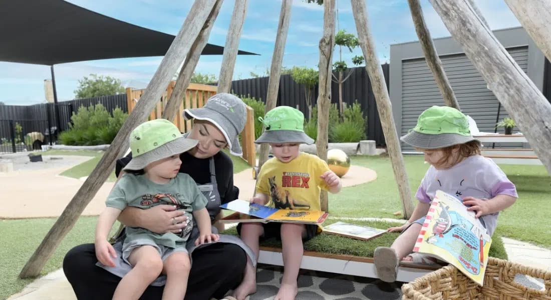 Children playing outdoors in a natural learning space
