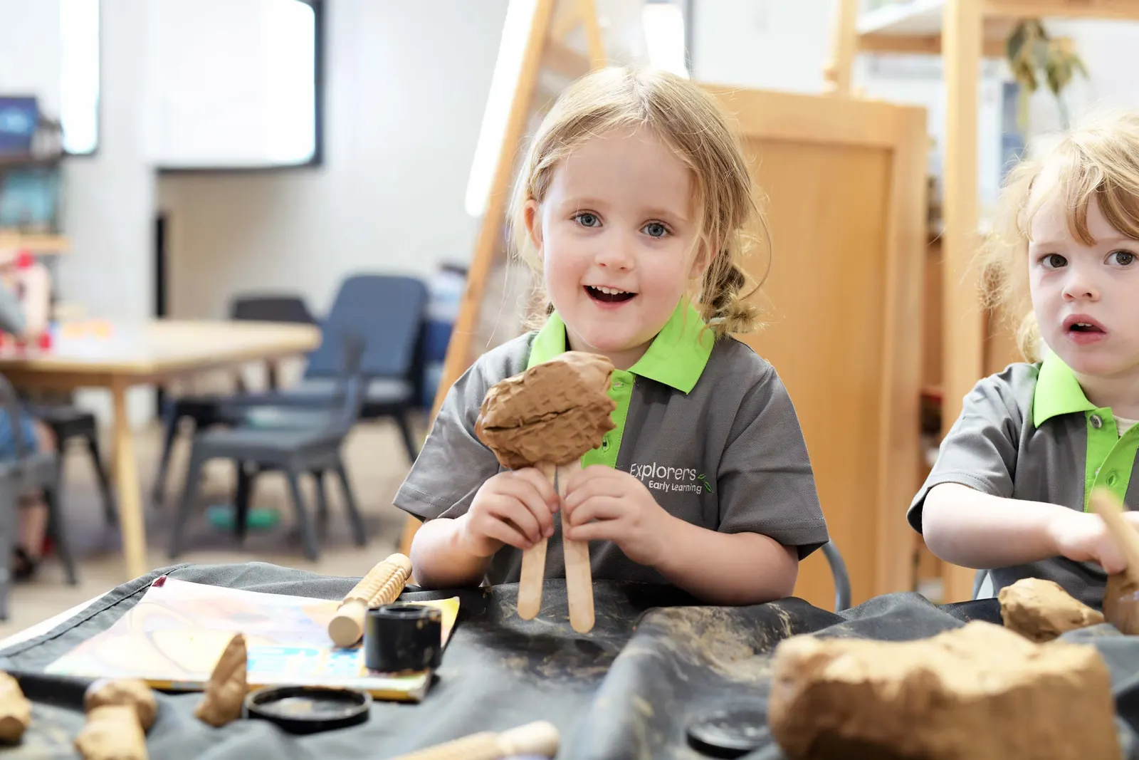 Children exploring clay