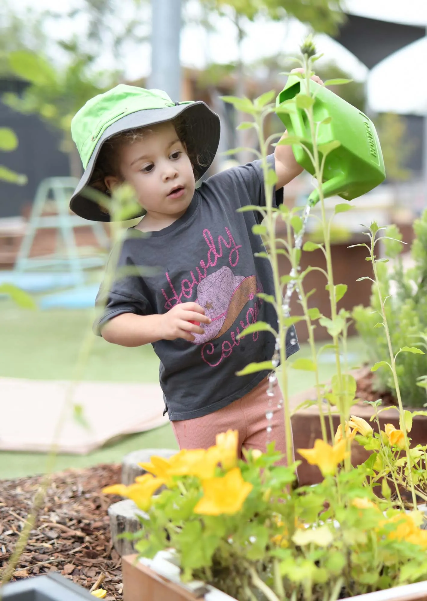Children exploring natural materials outdoors