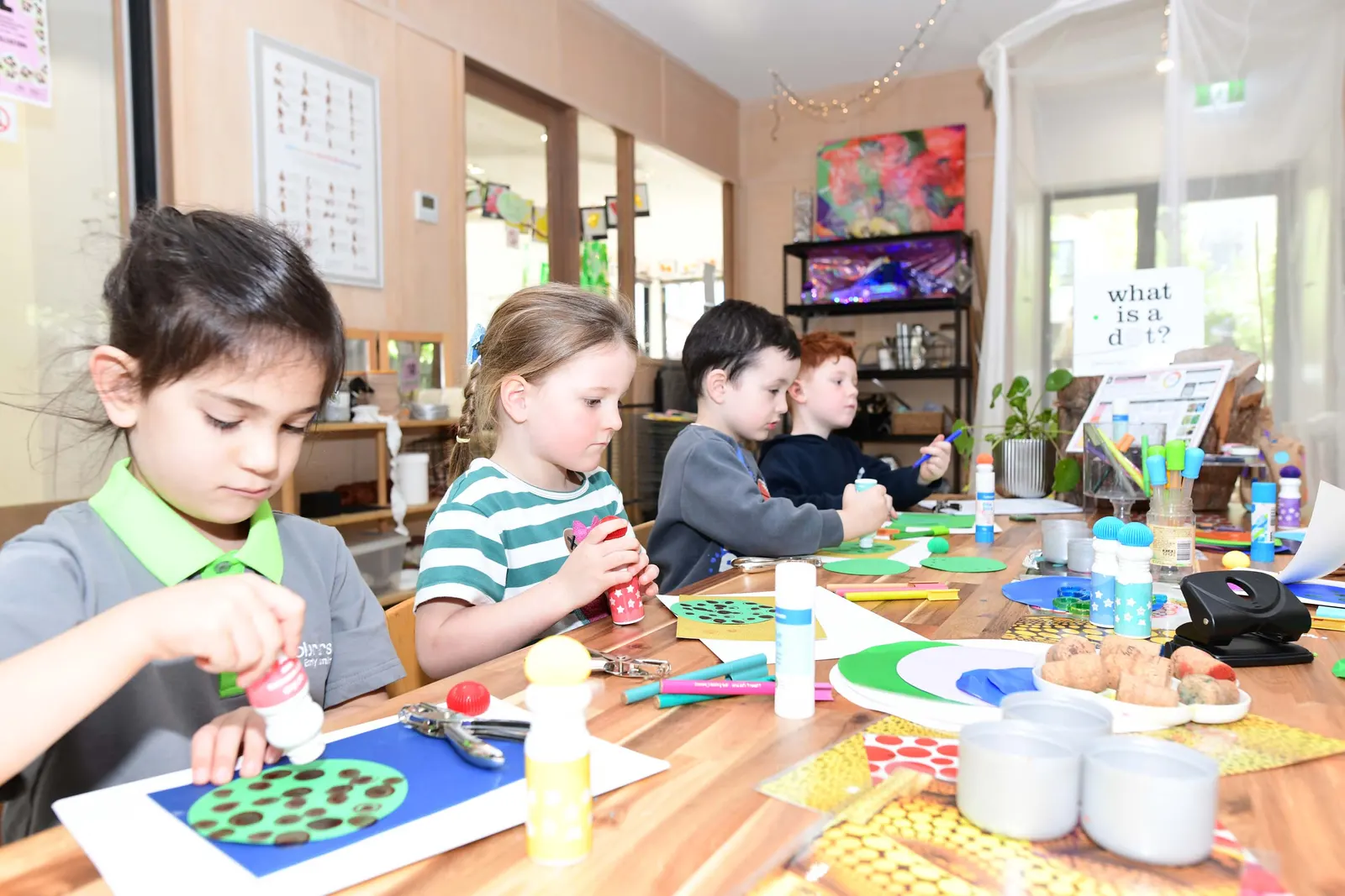 Children creating with paper