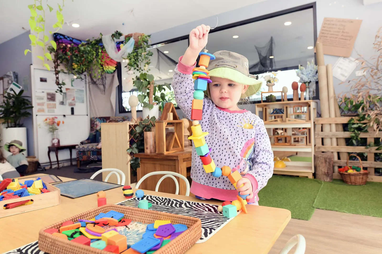 Child experimenting with materials and construction