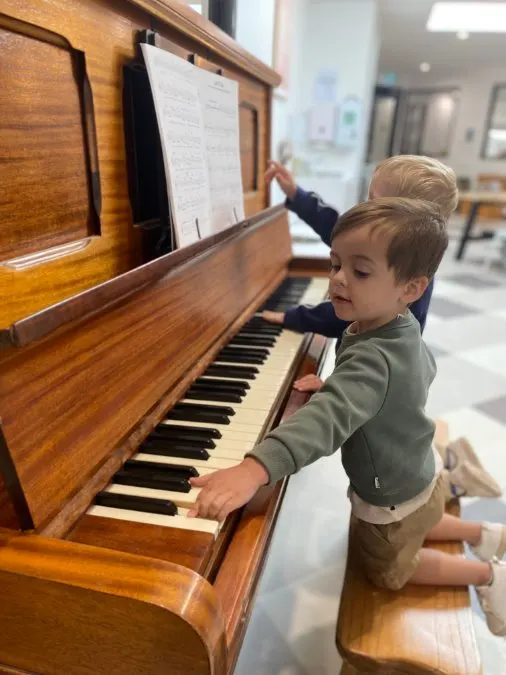 Child exploring a sensory creative experience