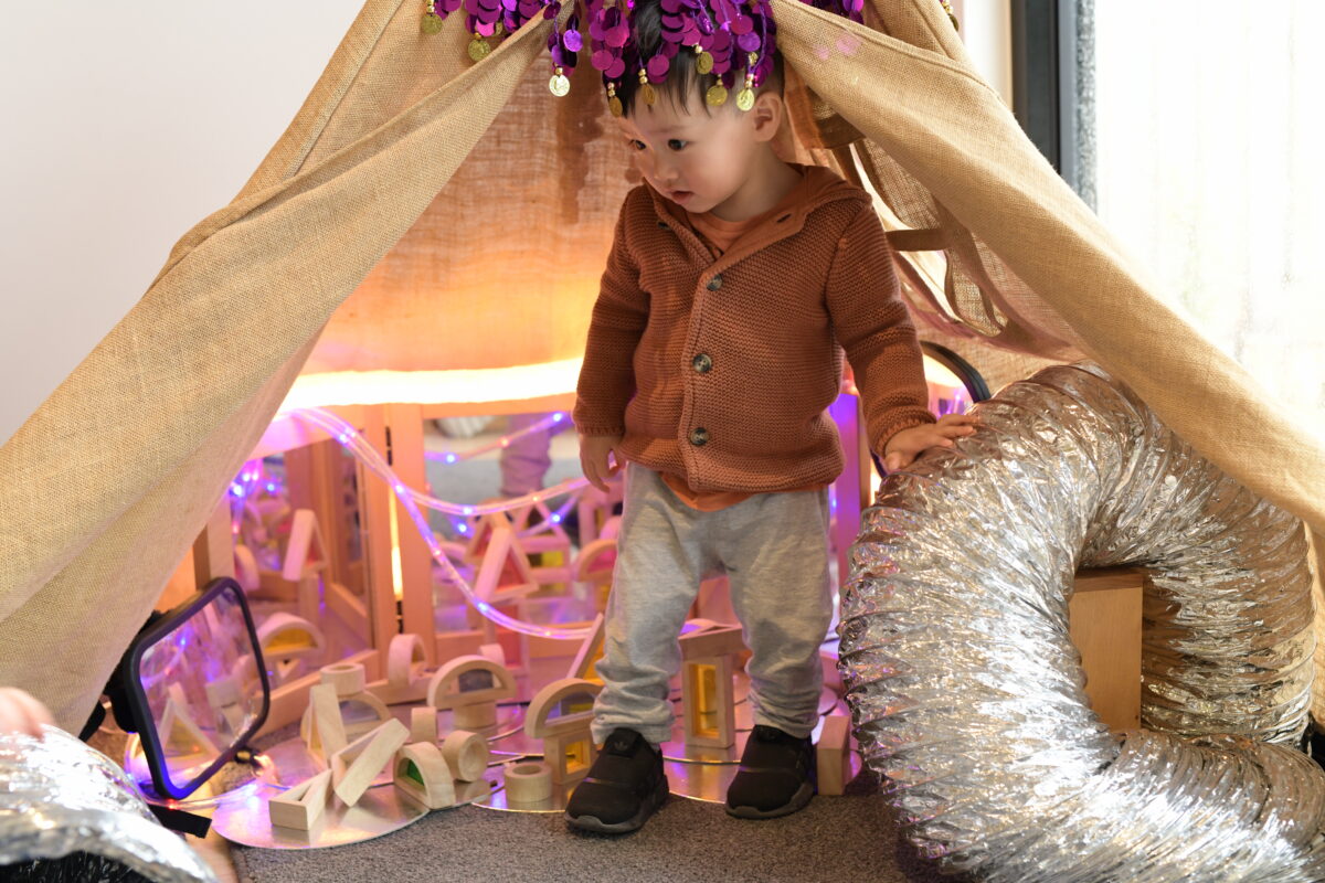 reggio emilia versus montassori child in tent