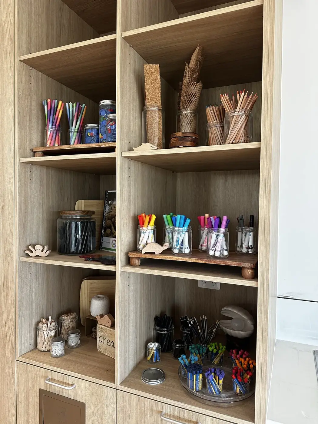 Beautifully organised open-ended art and creative materials on shelving at Armstrong Creek