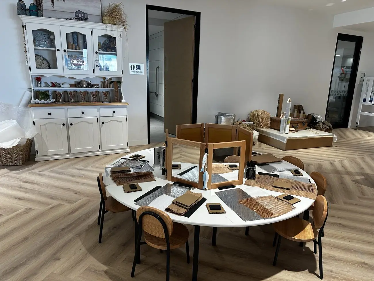 Reggio-inspired sensory and light exploration table set up with mirrors and natural materials