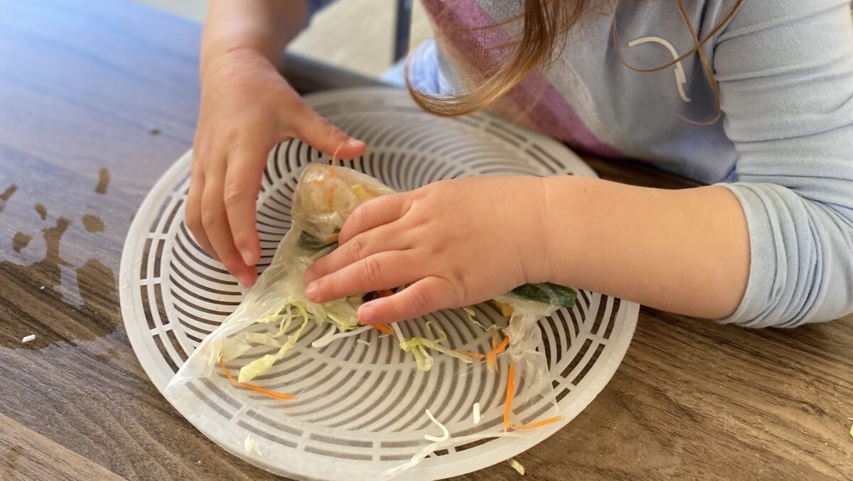 Child_Making Paper Rolls_Vegetables_Healthy_Nutrition