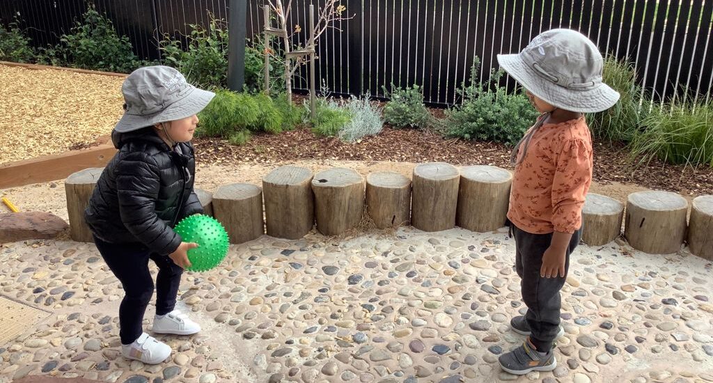 Children_Playing_Ball_Outdoors